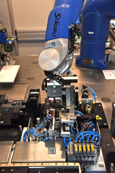 Robotic Assembly of Sensors in an Industry 4.0 Environment